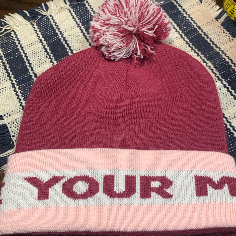 Love your melon Pom Pom hat. Like new
